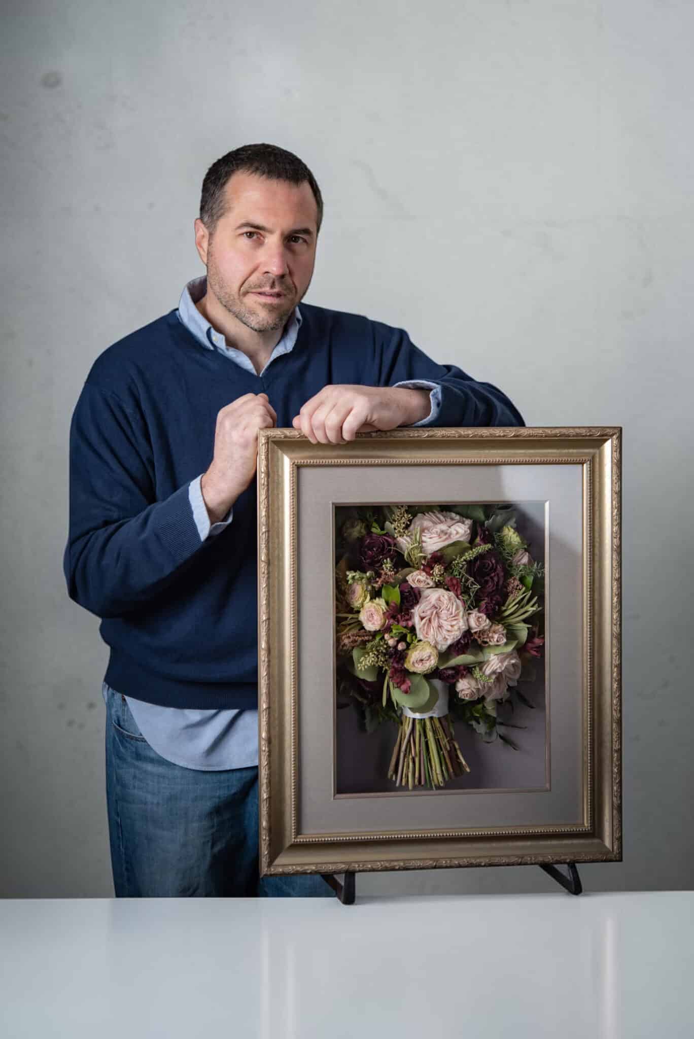 About 1 Daniel Marcey working with flowers in his Reston, VA studio